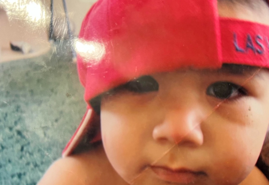 Baby Bryan in a red Las Vegas cap